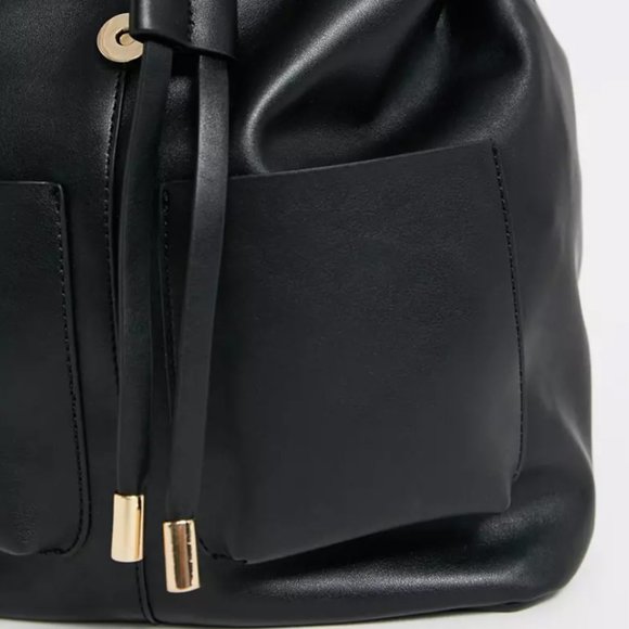 ASOS DESIGN slouchy backpack with oversized pocket - Picture 4 of 8
